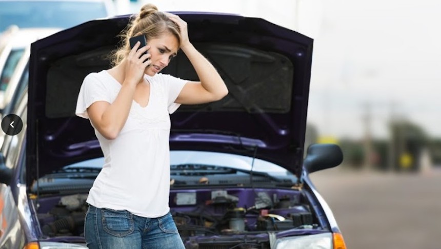 Woman stranded on the side of the road