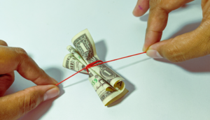 Tying up a one dollar bill